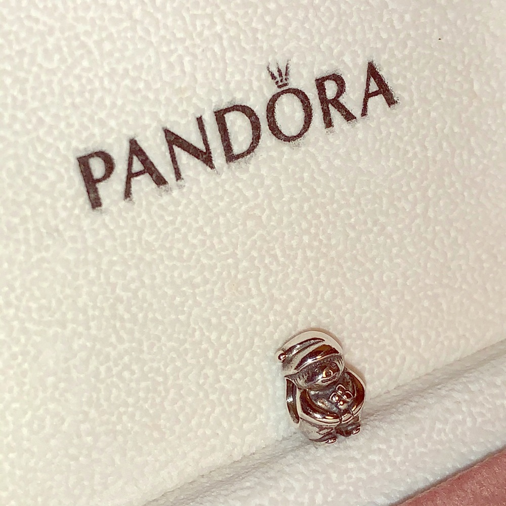 Pandora Charms little boy holds four-leaf clover